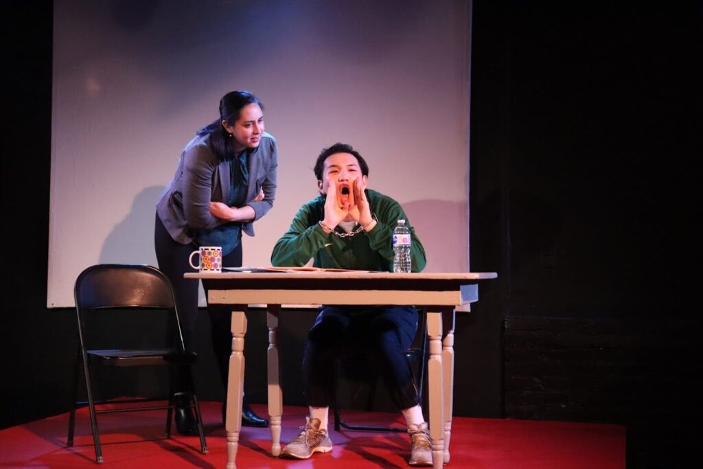 Scene from a The Confession stage production.